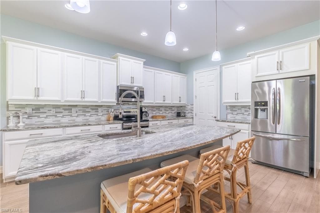 14717 Leeward Dr, Naples, FL 34114-15