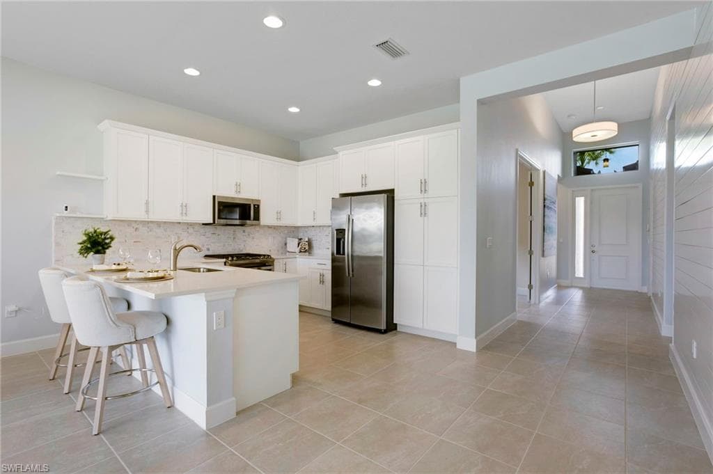 11543 Jacaranda Dr, Naples, FL 34120-3