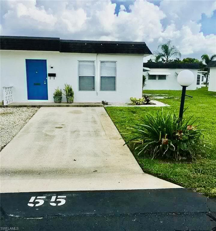 55 Tangerine Ct, Lehigh Acres, FL 33936-1