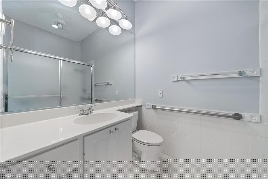 3060 Ellice Way, Naples, FL 34119-18