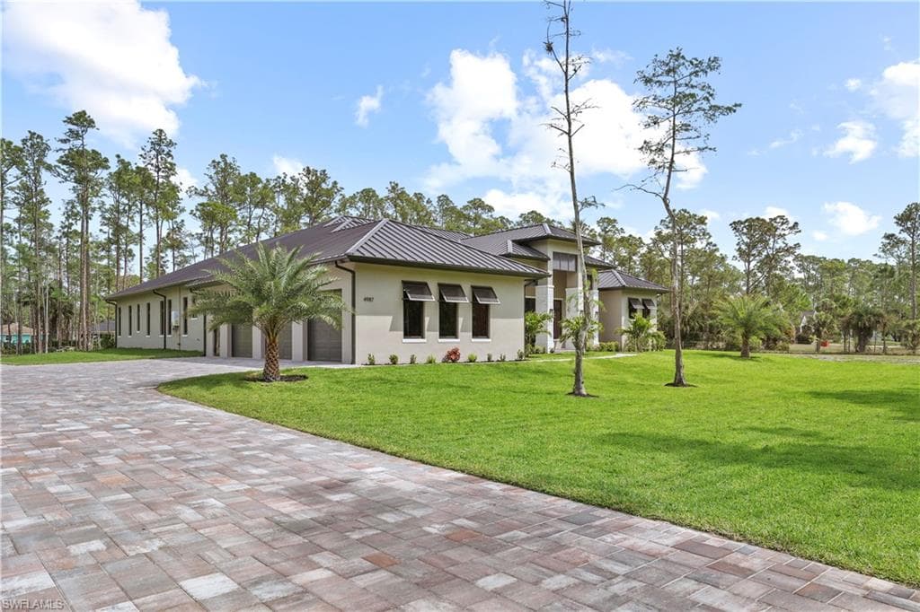 4987 Mahogany Ridge Dr, Naples, FL 34119-4