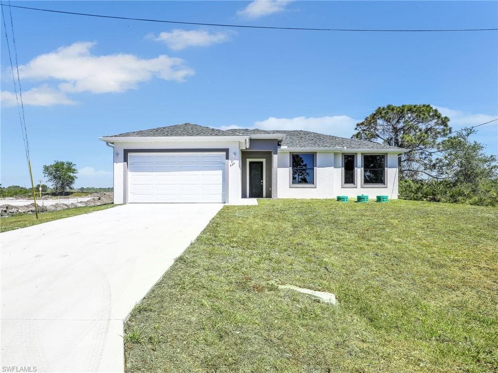 633 Cane St E, Lehigh Acres, FL 33974-1