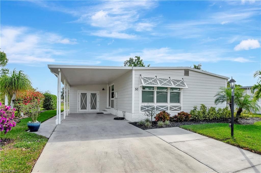 50 Le Mans Dr, Naples, FL 34112-3