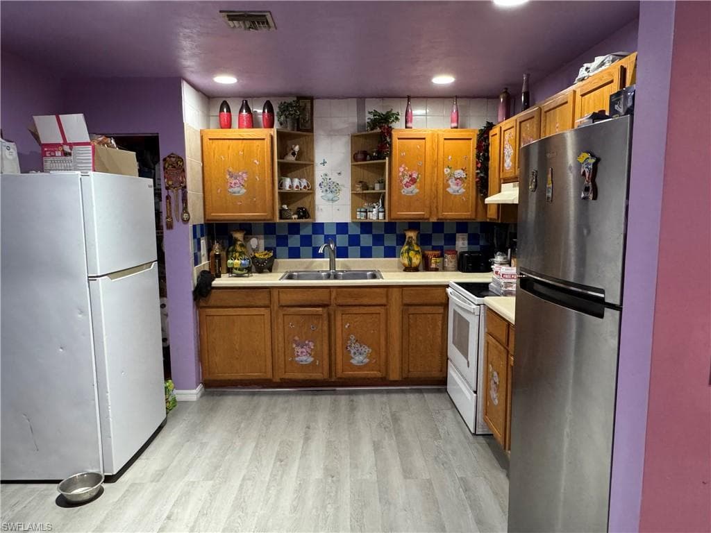 13557 Koinonia Dr, Naples, FL 34114-8