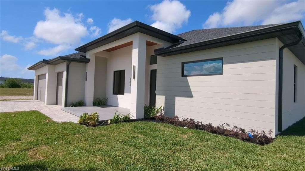 308 13th Ct, Cape Coral, FL 33991-3