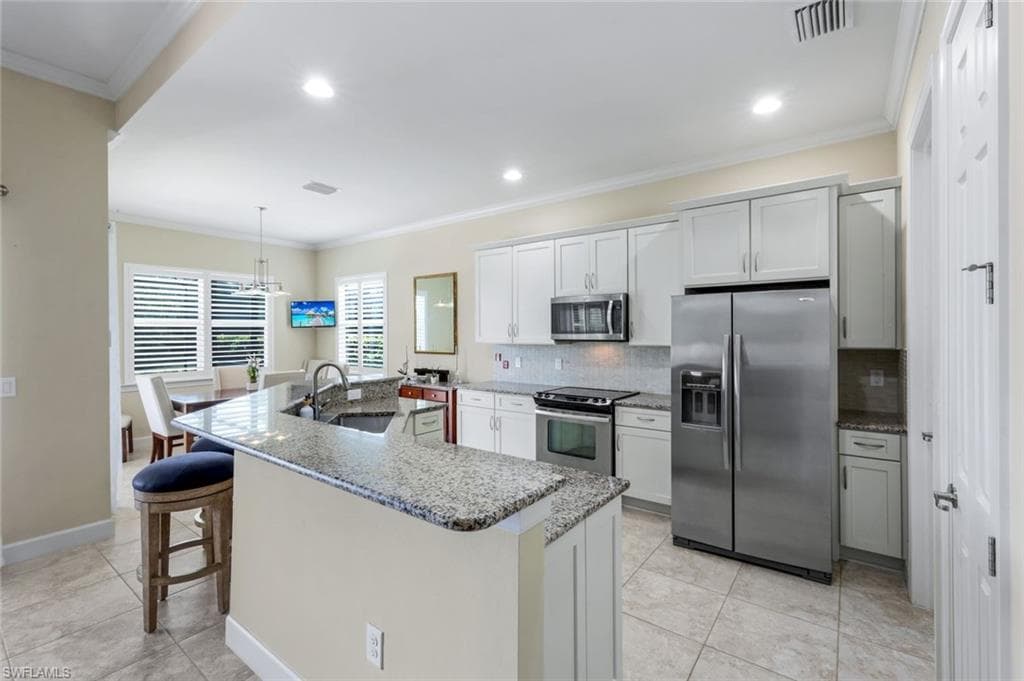 9102 Limestone Ln, Naples, FL 34120-12