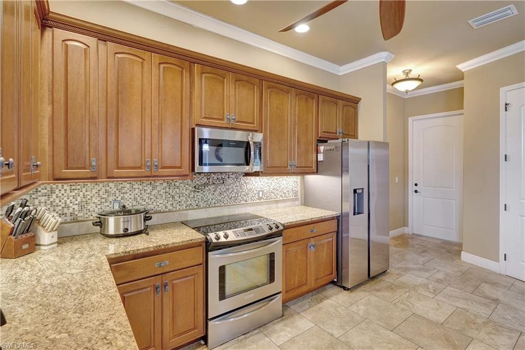 144 54th Ter, Cape Coral, FL 33914-15