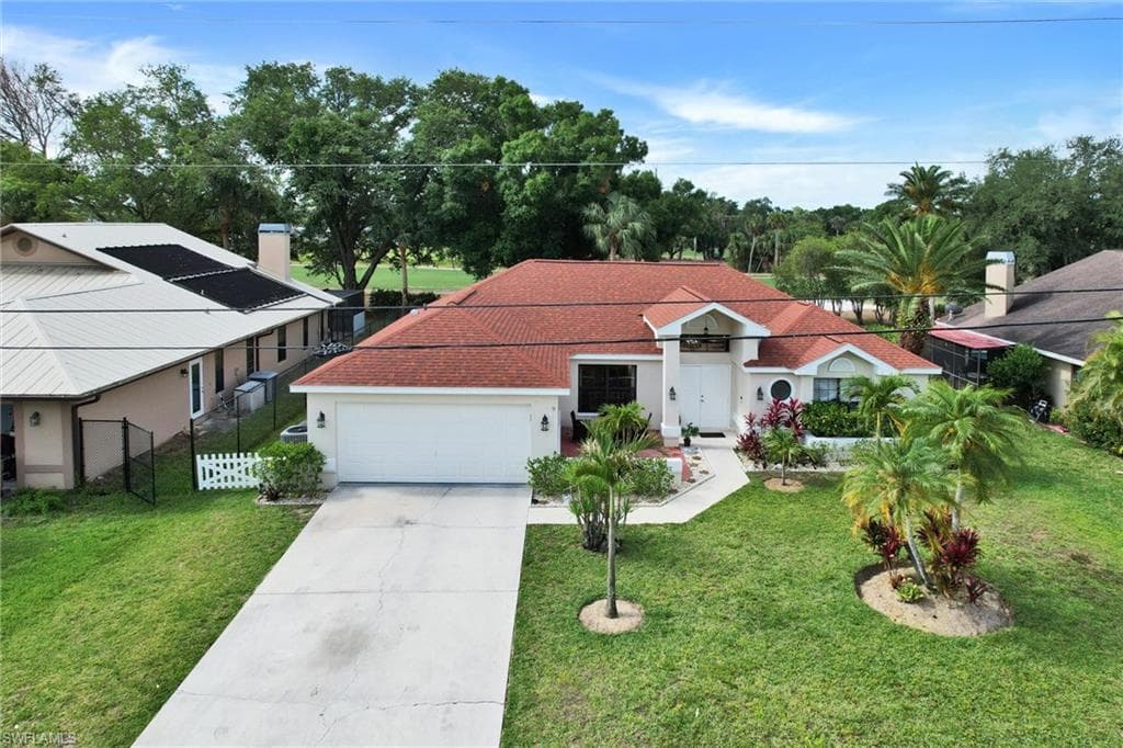 1803 Golfside Village Dr, Lehigh Acres, FL 33936-4