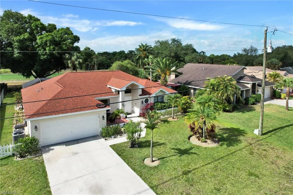 1803 Golfside Village Dr, Lehigh Acres, FL 33936-5