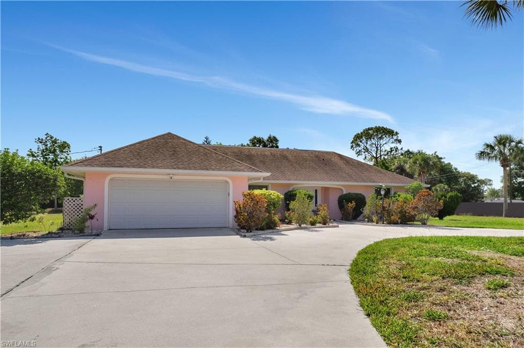 310 Lake Ave, Lehigh Acres, FL 33936-3