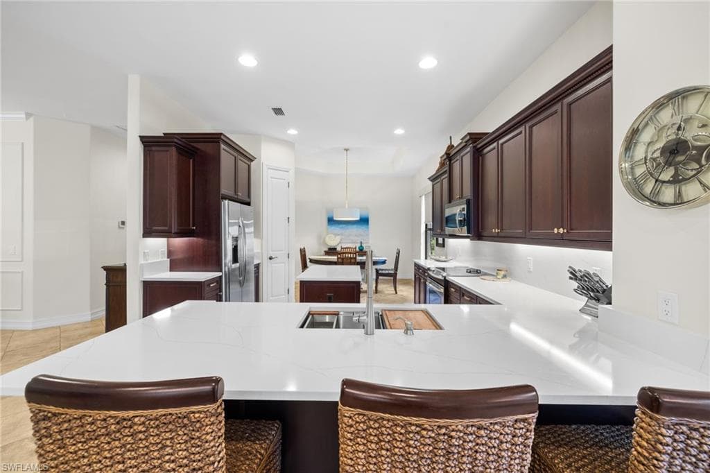 7591 Moorgate Point Way, Naples, FL 34113-14