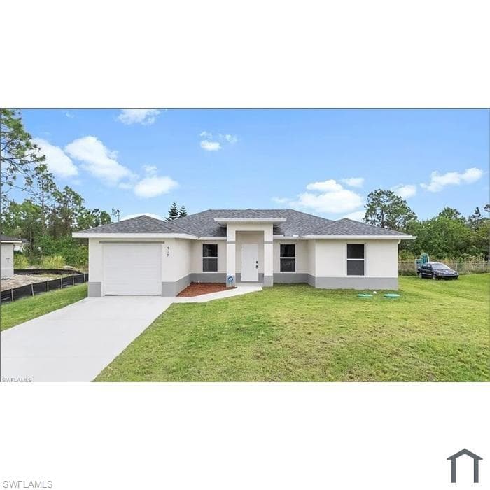 919 Hepburn Ave, Lehigh Acres, FL 33974-1