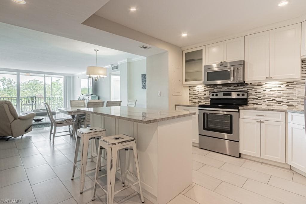 5 Bluebill Ave 303, Naples, FL 34108-4