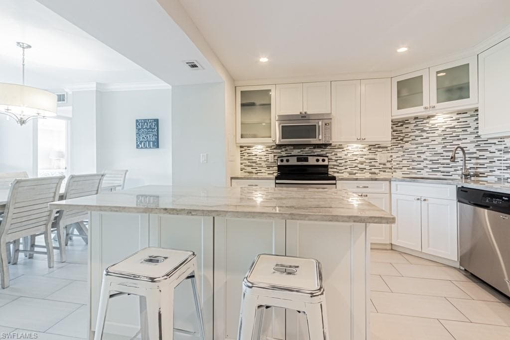 5 Bluebill Ave 303, Naples, FL 34108-5
