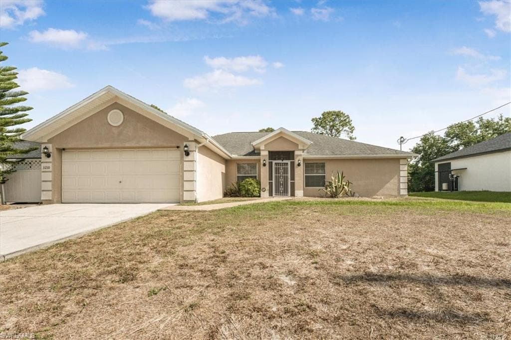 3210 31st St W, Lehigh Acres, FL 33971-1