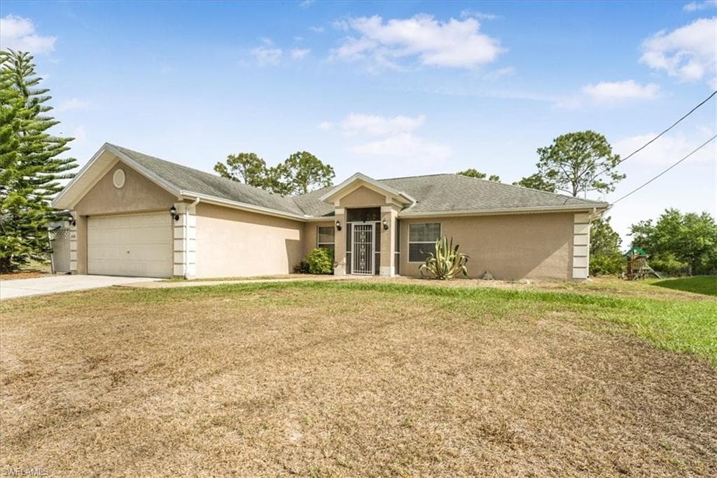 3210 31st St W, Lehigh Acres, FL 33971-3