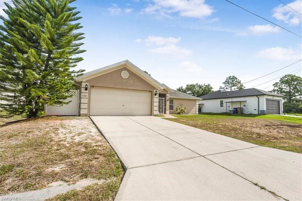 3210 31st St W, Lehigh Acres, FL 33971-4