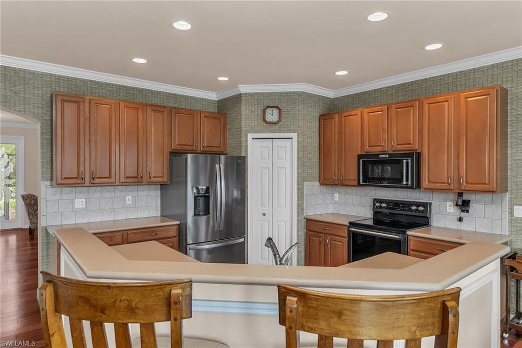 7859 Berkshire Pines Dr, Naples, FL 34104-9