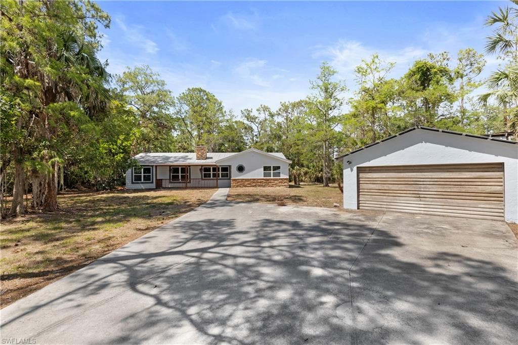 221 18th Ave NW, Naples, FL 34120-1