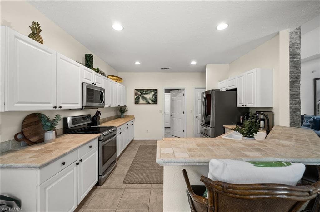 6996 Burnt Sienna Cir, Naples, FL 34109-14