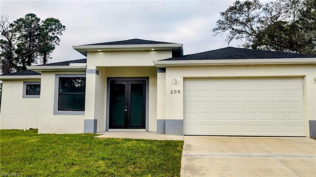 208 Genoa Ave S, Lehigh Acres, FL 33974-3