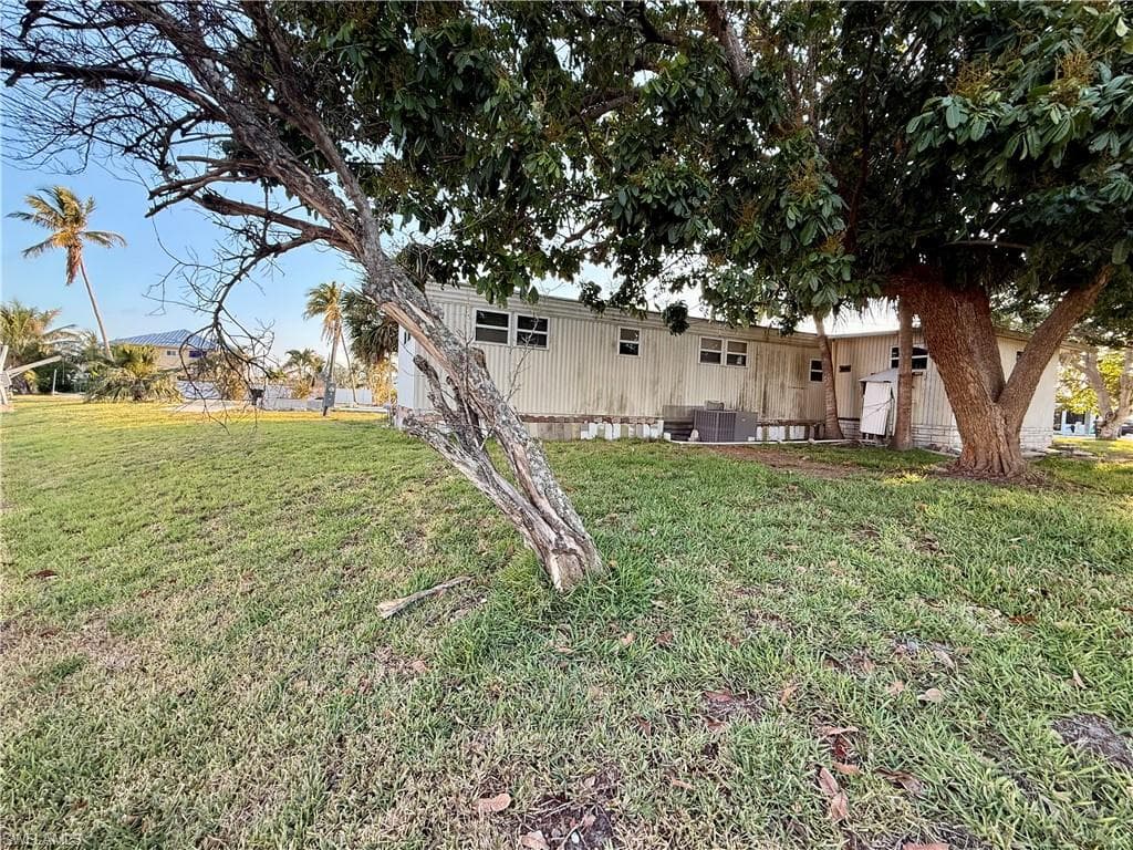 24518 Dolphin St, Bonita Springs, FL 34134-9