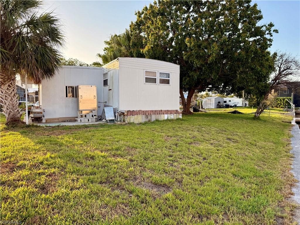 24518 Dolphin St, Bonita Springs, FL 34134-7