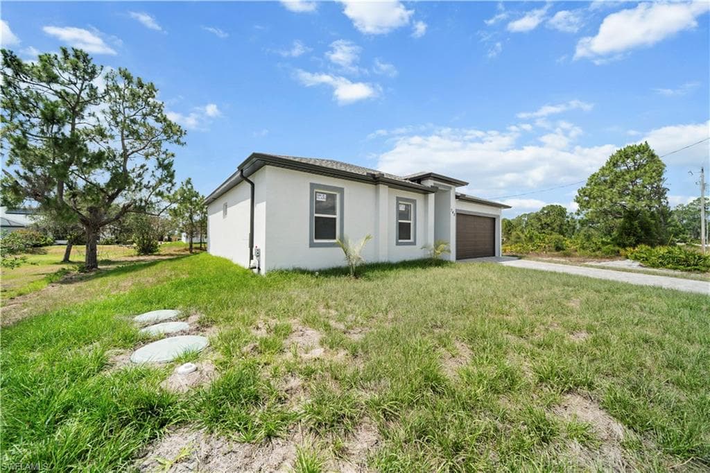 740 Newhall St E, Lehigh Acres, FL 33974-9