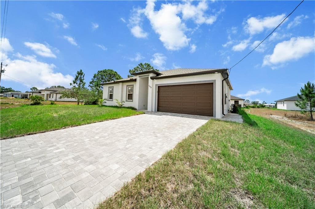 740 Newhall St E, Lehigh Acres, FL 33974-1