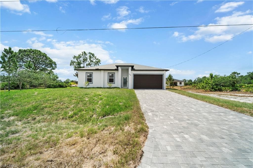 740 Newhall St E, Lehigh Acres, FL 33974-3