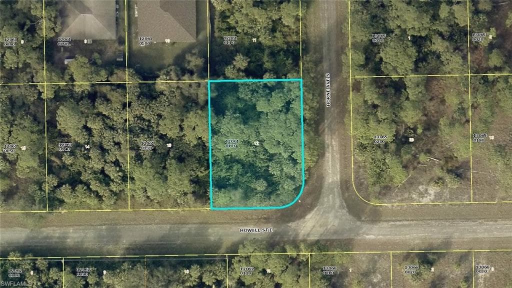 1229 Howell St E, Lehigh Acres, FL 33974-2