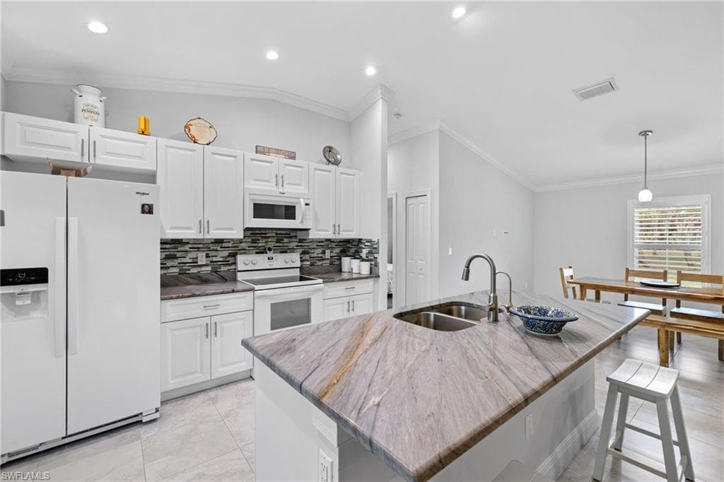 1187 16th Ave NE, Naples, FL 34120-1