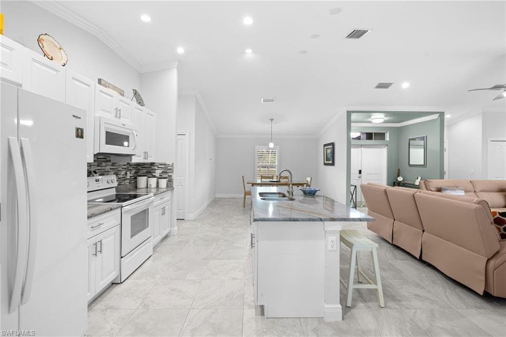 1187 16th Ave NE, Naples, FL 34120-23