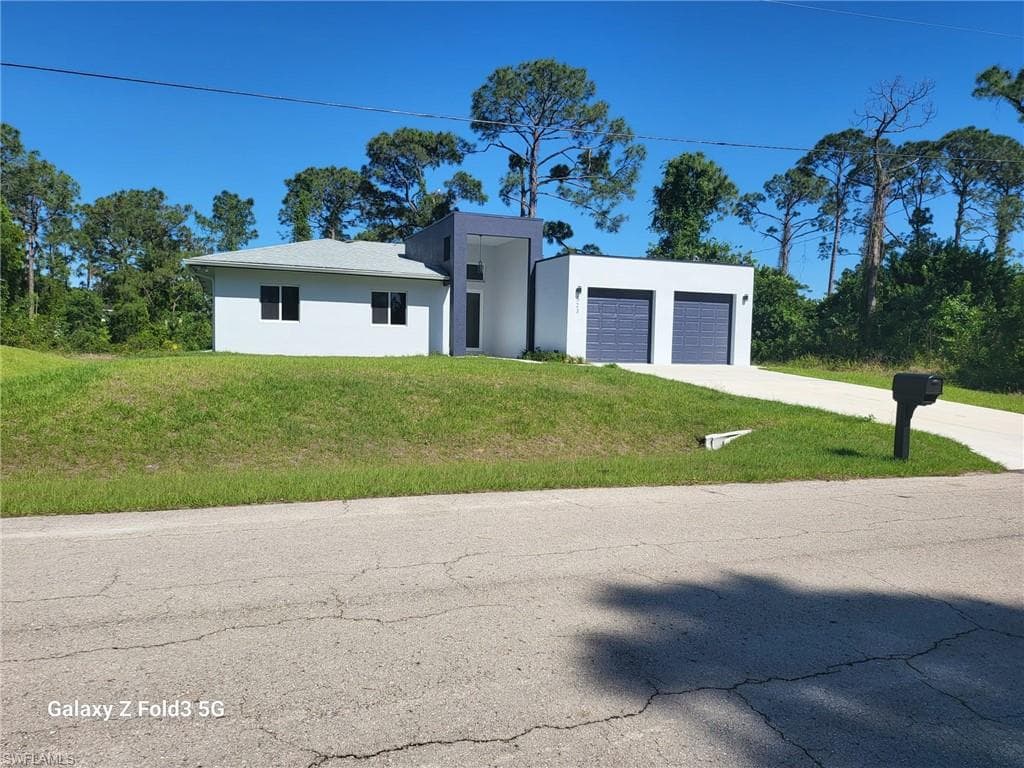 521 Frank Jewett Ave S, Lehigh Acres, FL 33974-1