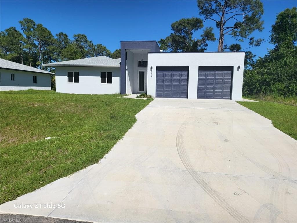 521 Frank Jewett Ave S, Lehigh Acres, FL 33974-3