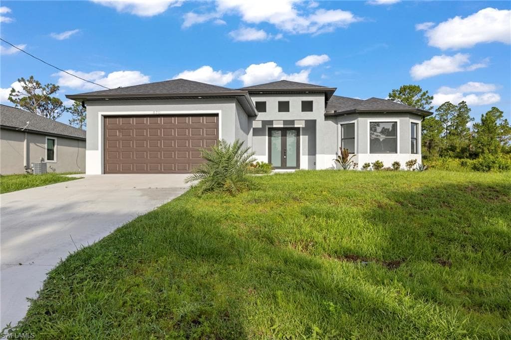 570 Sherwood Ave S, Lehigh Acres, FL 33974-7