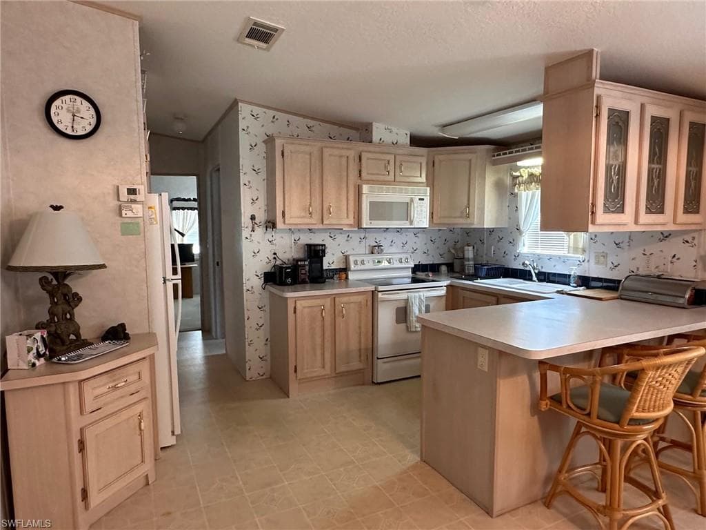 1307 Silver Lakes Blvd, Naples, FL 34114-15