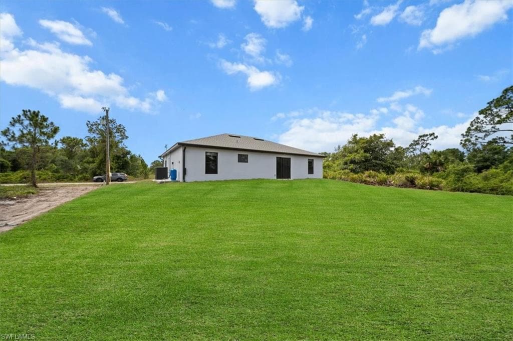 1032 Maxwell Ave S, Lehigh Acres, FL 33974-33
