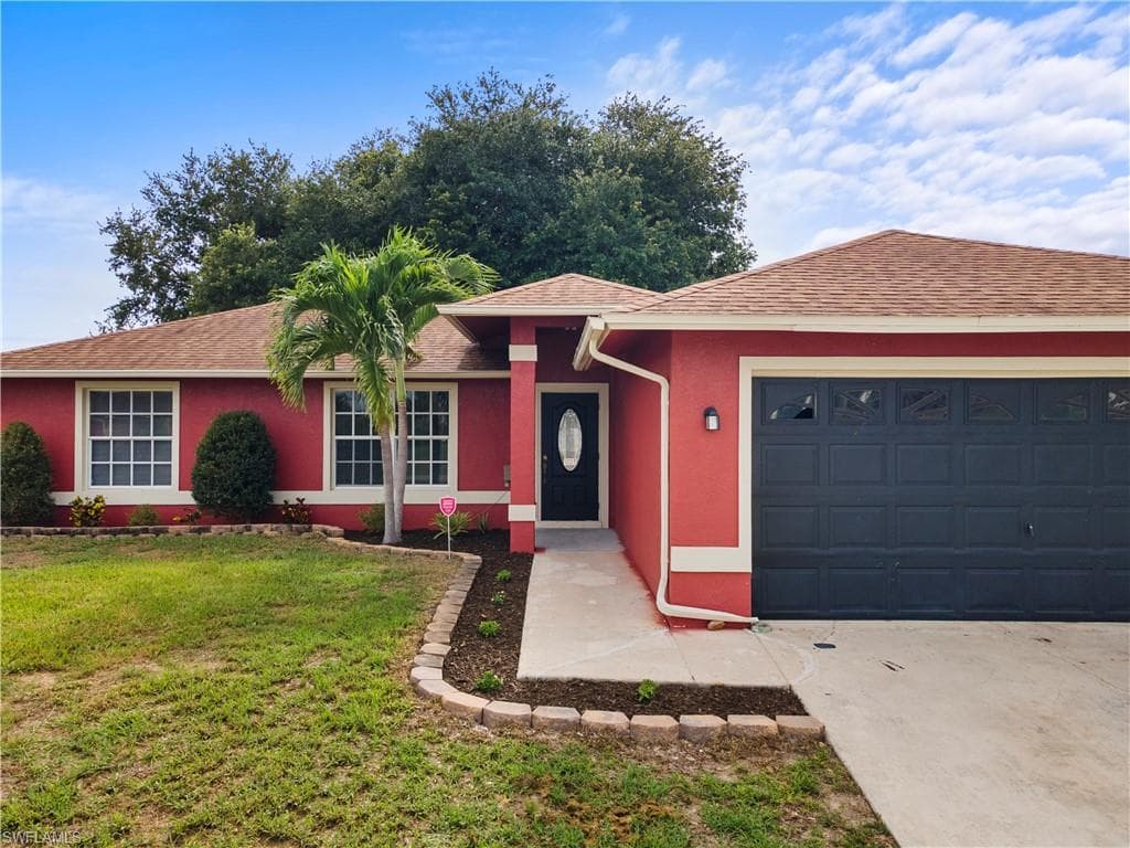 913 Allman Ave, Lehigh Acres, FL 33971-1