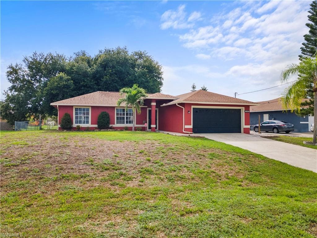 913 Allman Ave, Lehigh Acres, FL 33971-3