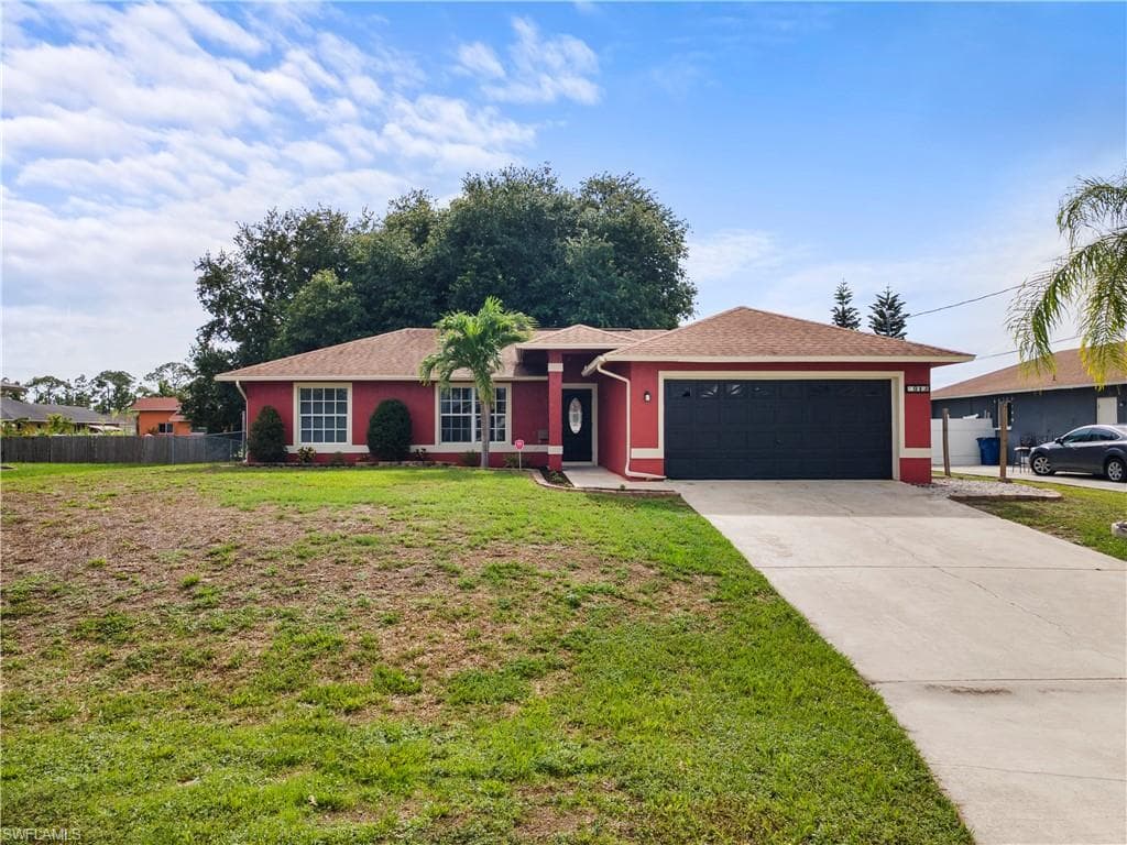 913 Allman Ave, Lehigh Acres, FL 33971-4