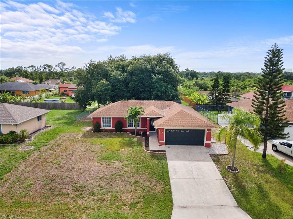 913 Allman Ave, Lehigh Acres, FL 33971-5