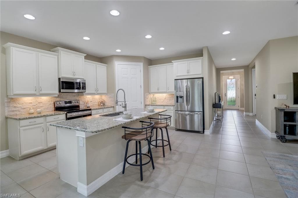 14594 Tropical Dr, Naples, FL 34114-2