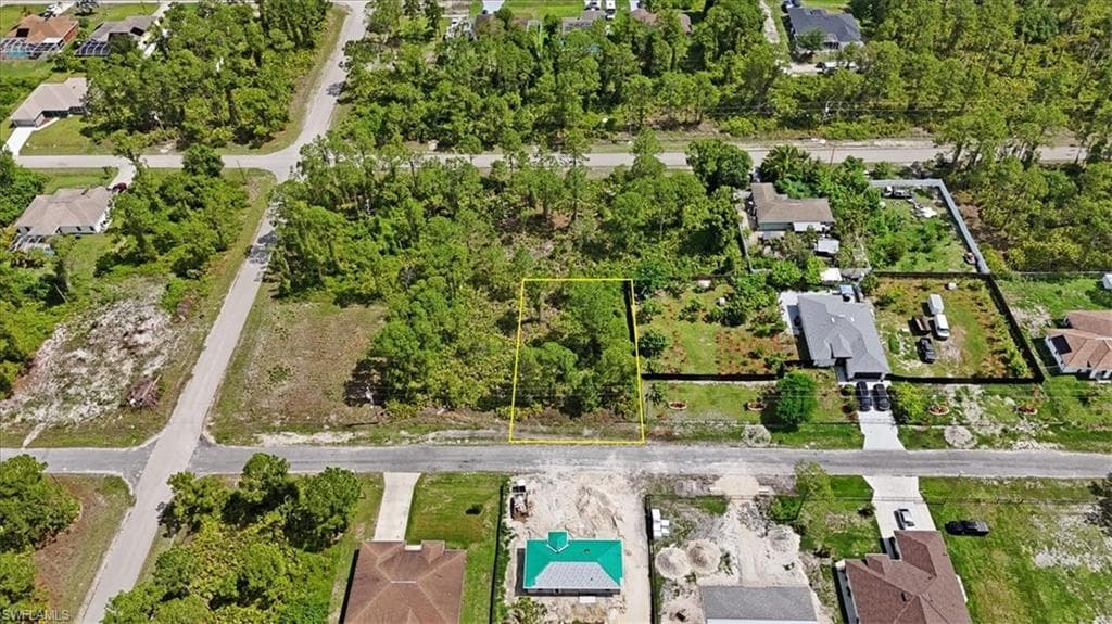 1065 Bells St E, Lehigh Acres, FL 33974-4