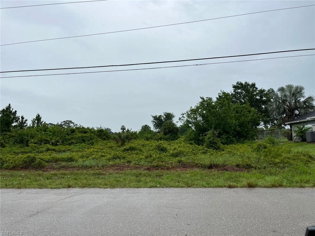 731 Bently St E, Lehigh Acres, FL 33974-3