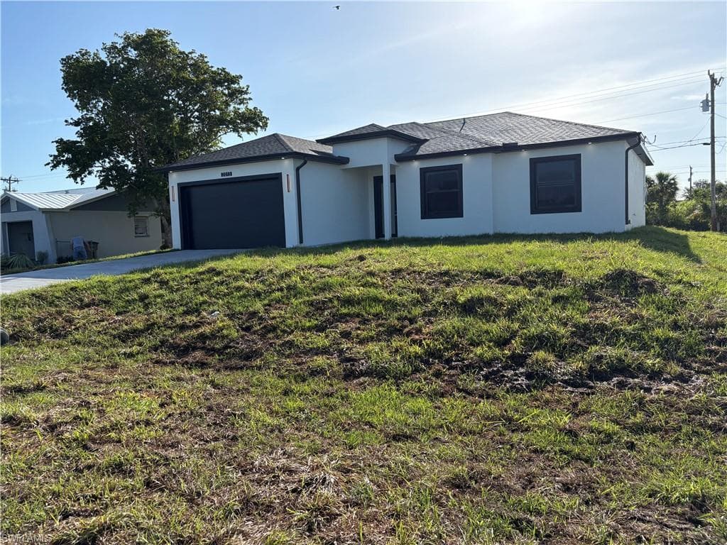 306 10th Ter, Cape Coral, FL 33909-2