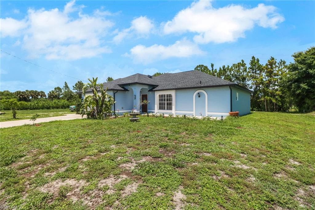765 Aprile Ave S, Lehigh Acres, FL 33974-3