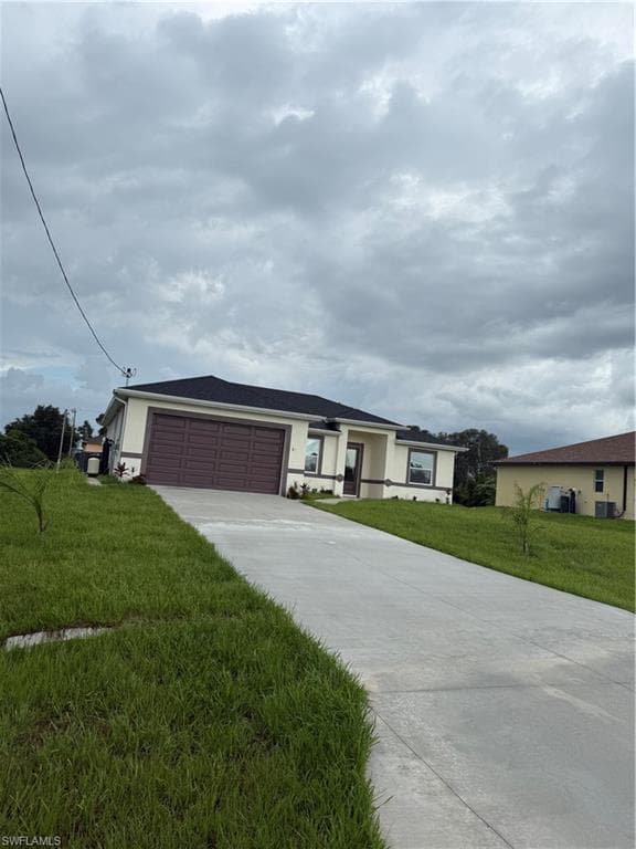 311 Rand Ave, Lehigh Acres, FL 33974-2