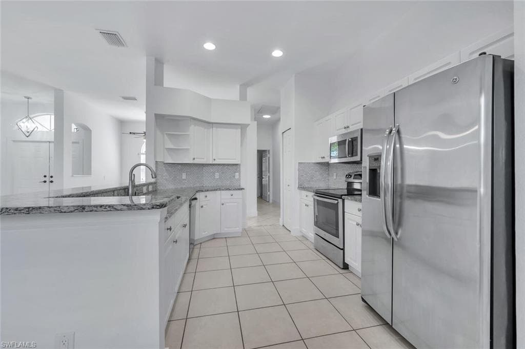 973 Summerfield Dr, Naples, FL 34120-12