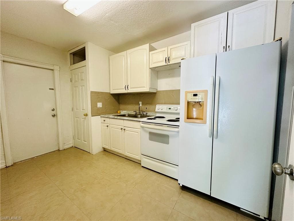 914 Avery St E, Lehigh Acres, FL 33974-19